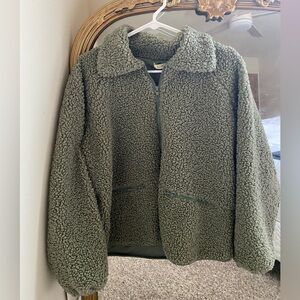 green fluffy jacket